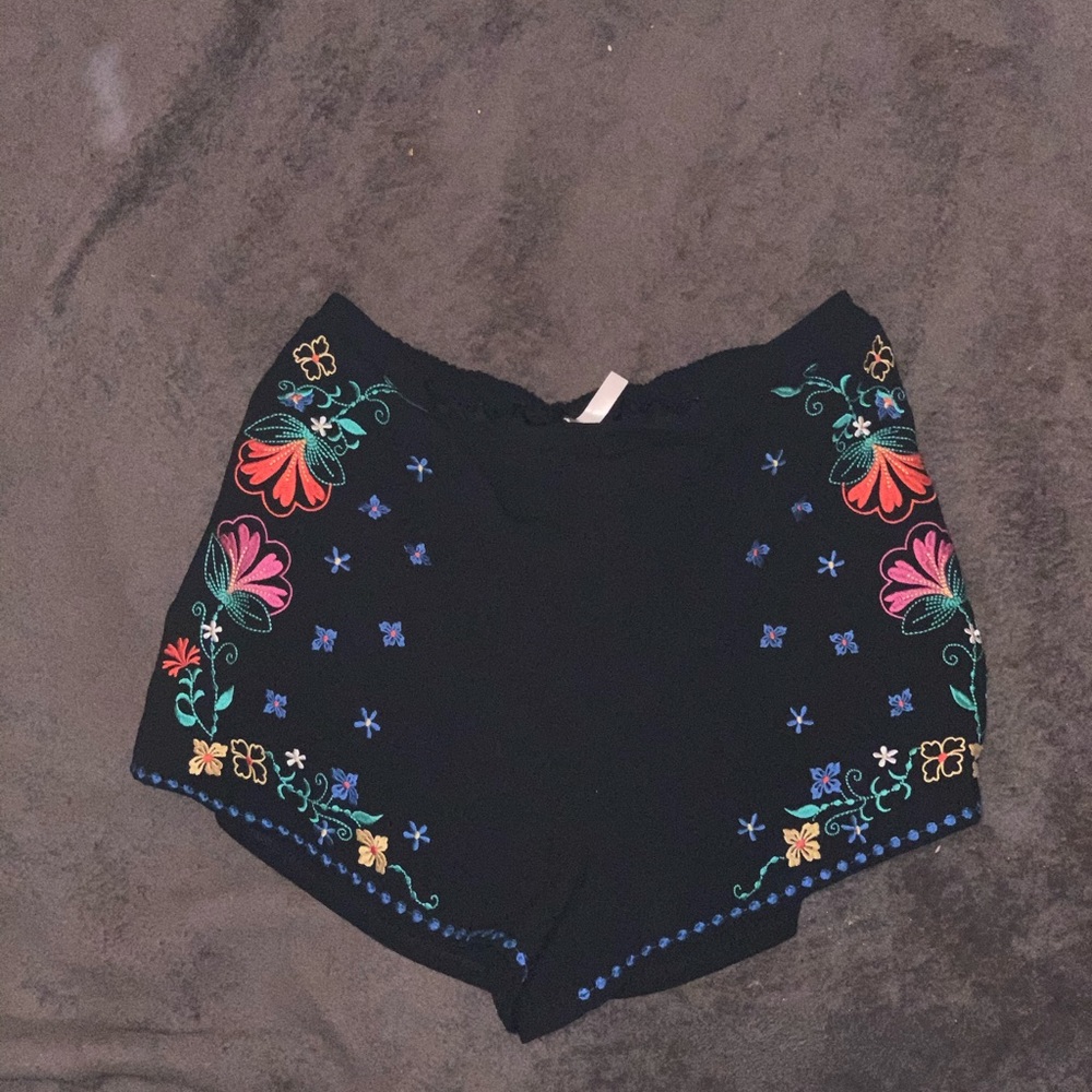 Black shorts with floral design